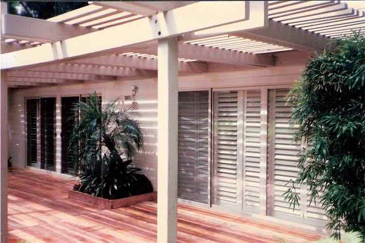 Sliding Patio Doors Vinyl Frame Almond and Redwood Deck